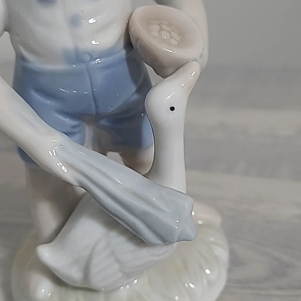 Unique Vintage Blue and White Porcelain Boy with Goose Figurine